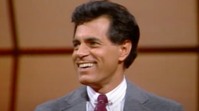 Peter Tomarken smiling while hosting Press Your Luck