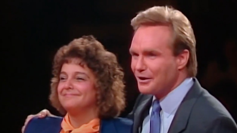 Ray Combs smiling with family feud contestant