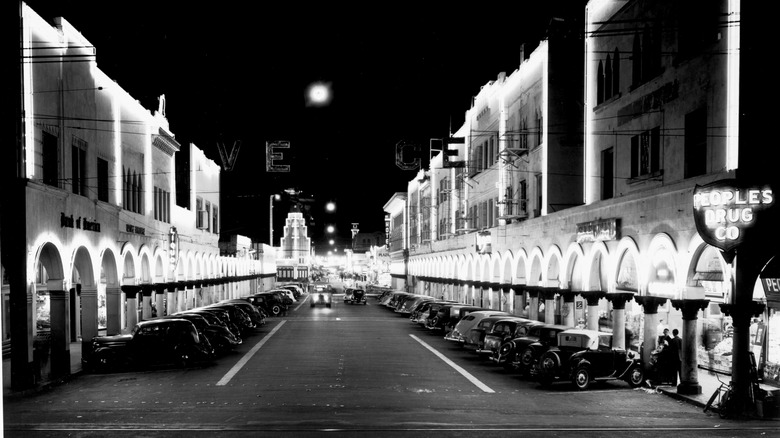 brightly lit street in Venice, California, at night in 1930