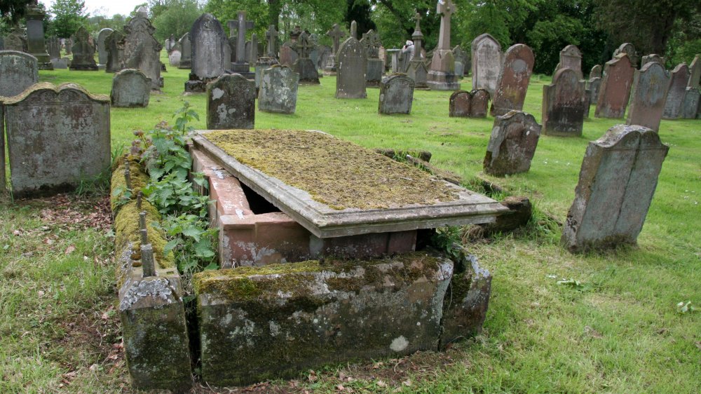 Grave with topstone moved.