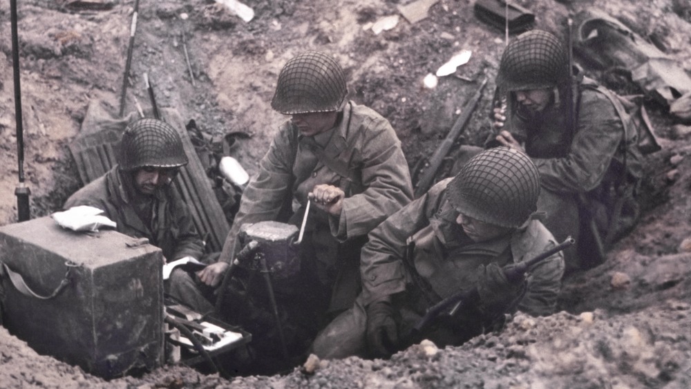 wwii signal corps radio operators in trenches