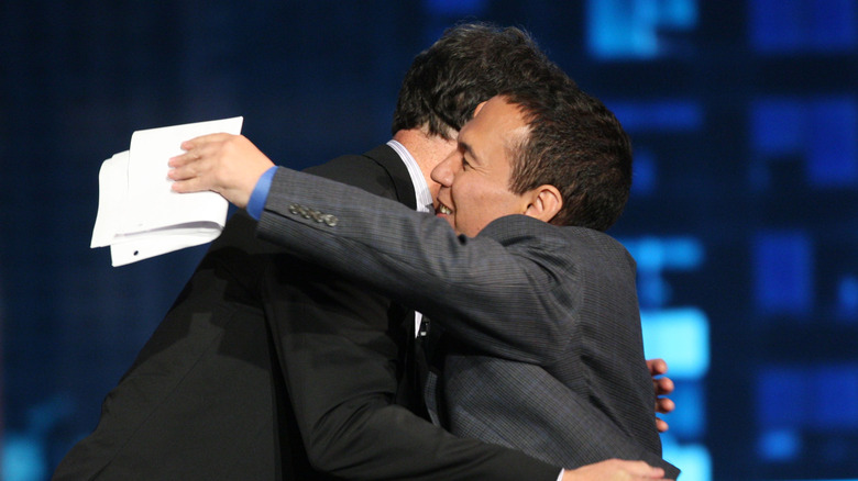 Bob Saget and Gilbert Gottfried hugging