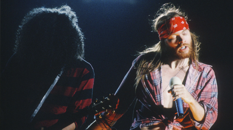 Slash and Axl performing