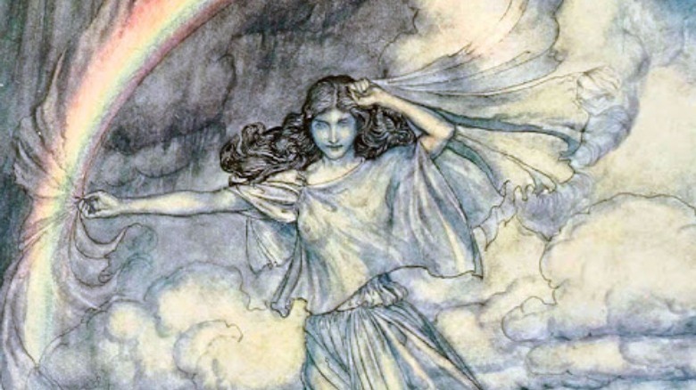 Iris in cloud holding rainbow