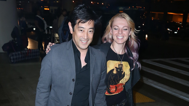 Grant Imahara walking with Jennifer Newman