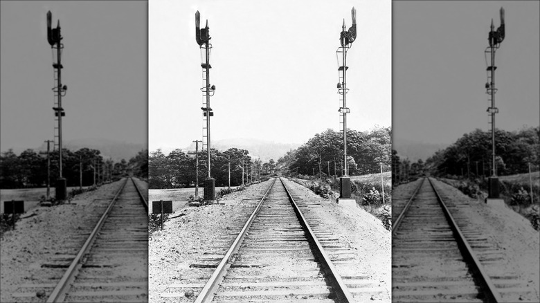 Early signal boxes beside railroad