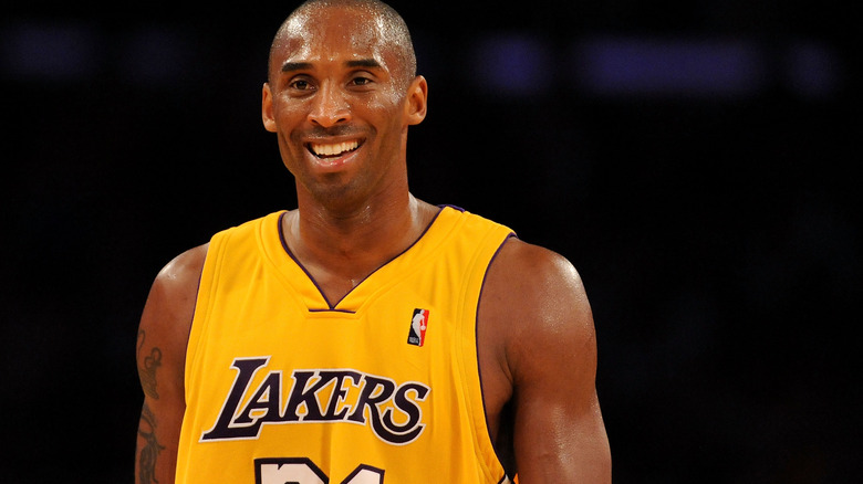 Kobe Bryant smiling in Lakers jersey