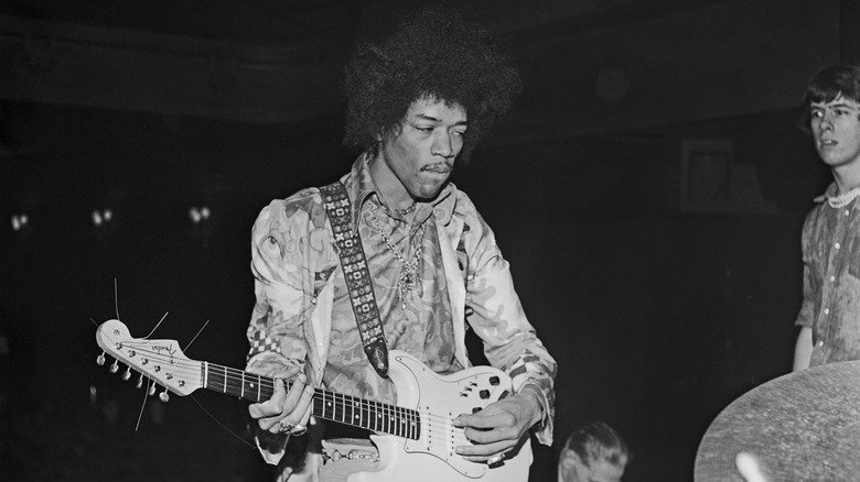 Jimi Hendrix playing guitar during soundcheck