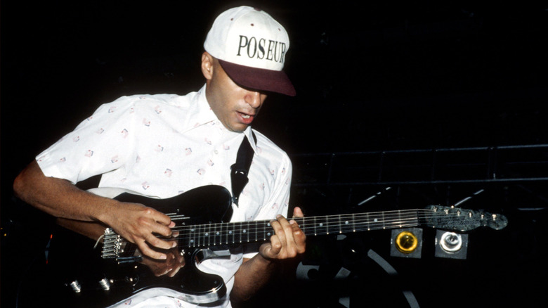 Tom Morello playing guitar onstage