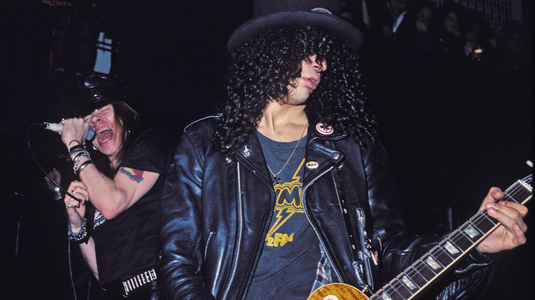 Axl Rose and Slash performing in concert