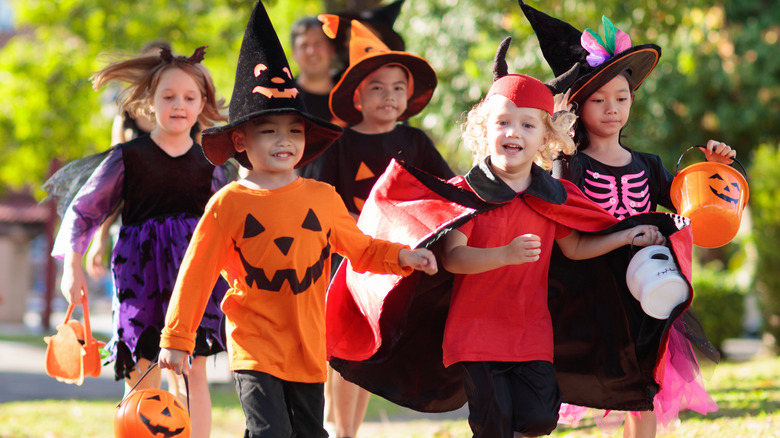 Trick-or-treaters in daylight