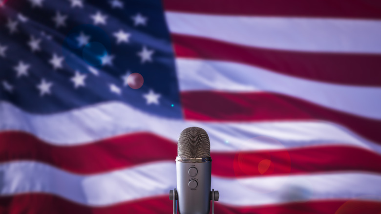 American flag with microphone