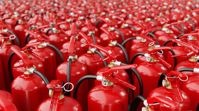 many red fire extinguishers