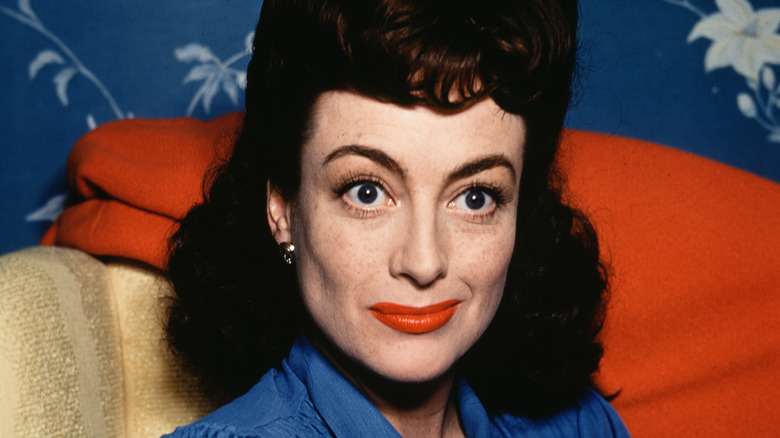 Joan Crawford smirking