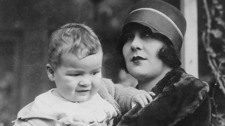 Lita Grey holding baby