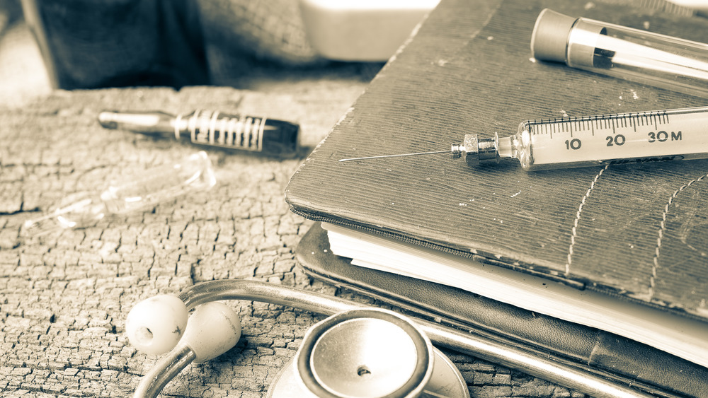 medical syringes and stethoscope