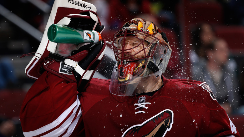 Mike SMith getting a drink