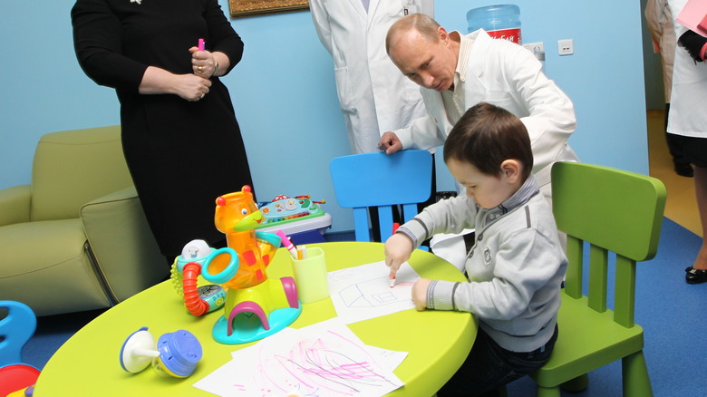 putin visiting a maternity hospital