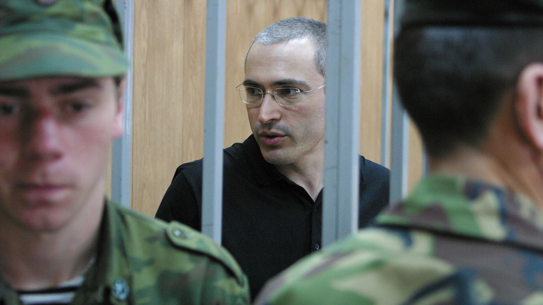 Mikhail Khodorkovsky in a cage at his trial