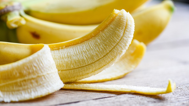 partially peeled banana