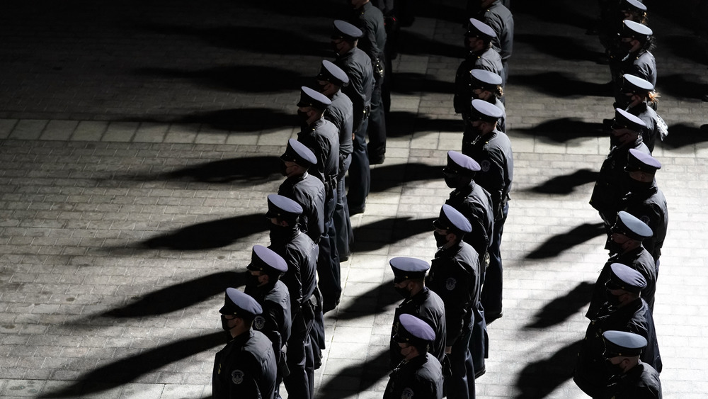 Policemen lined up