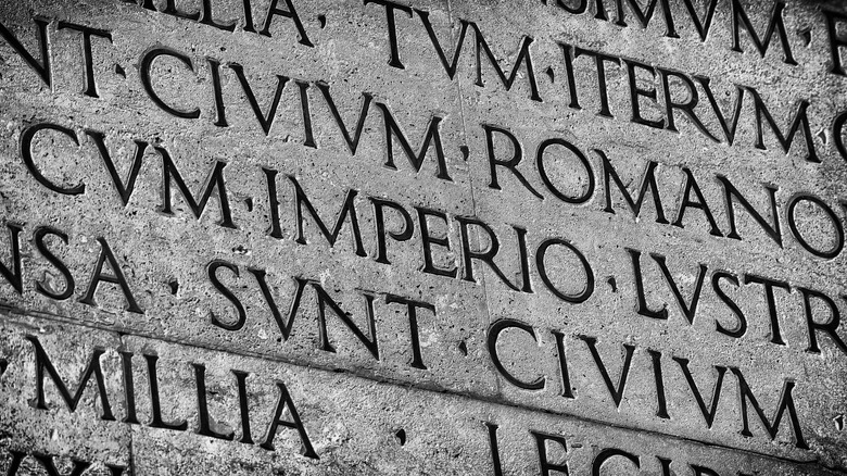 latin letters on stone