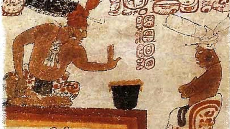 Ancient Mayans bartering over chocolate