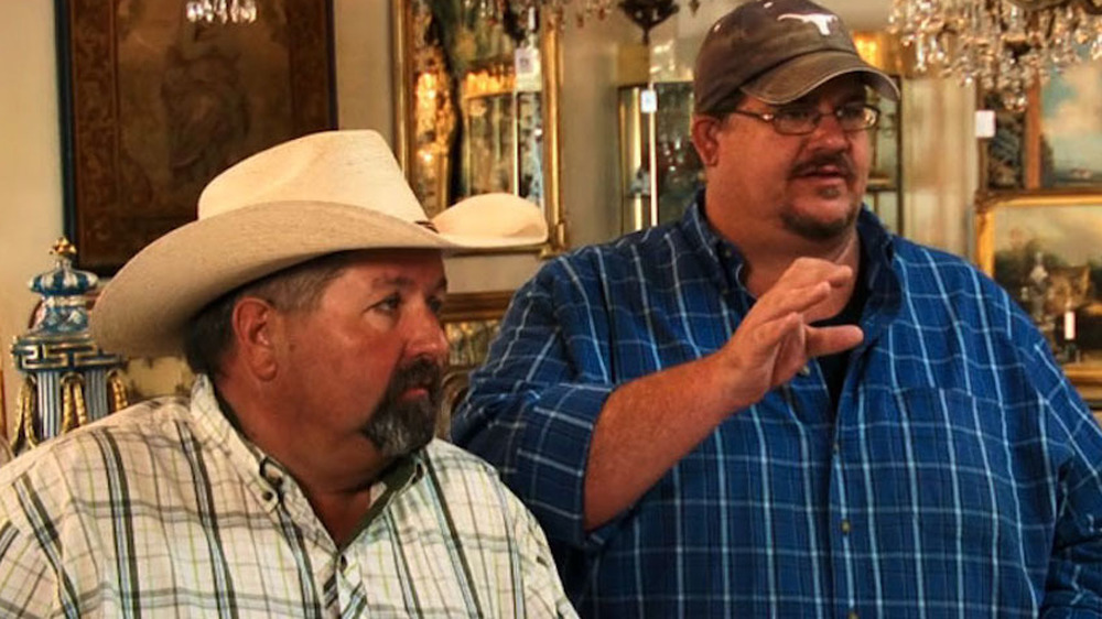 Randy Smith and Bubba Smith wearing hats