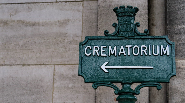 Sign pointing to crematorium