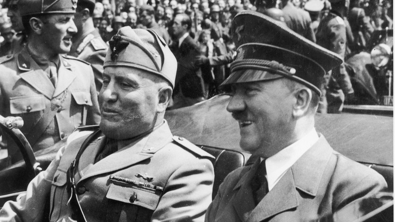 Hitler and Mussolini talking in car