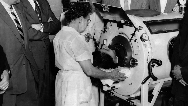 A patient in an iron lung