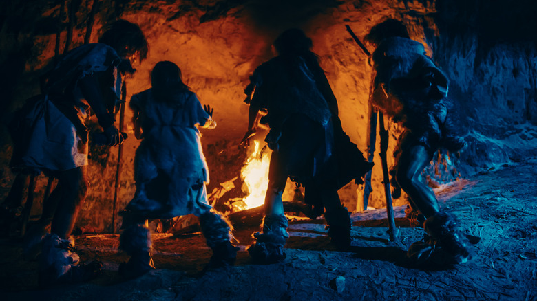 people around a fire