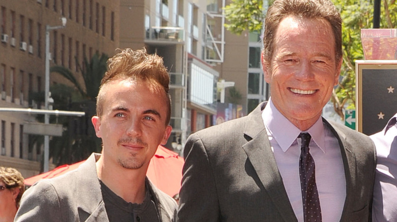 Frankie Muniz posing with Bryan Cranston at Hollywood Walk of Fame