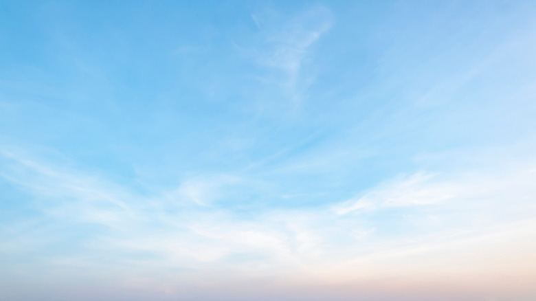 blue sky with wispy clouds