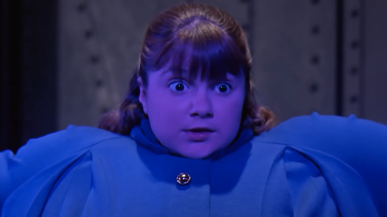 Violet Beauregarde swelling up like a blueberry