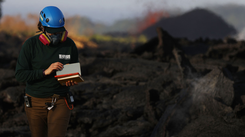 scientist working on the volcano