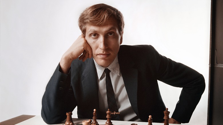 bobby fischer with chess board