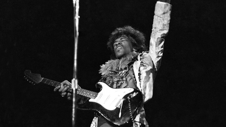 Jimi Hendrix performing