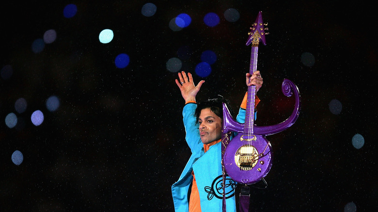 Prince with symbol guitar