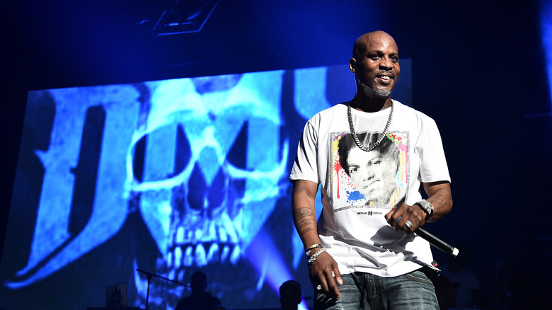 DMX performing in front of a skull image