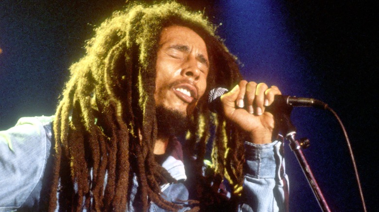 Bob Marley performing on stage 