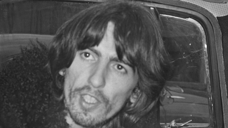 George Harrison looking out of car