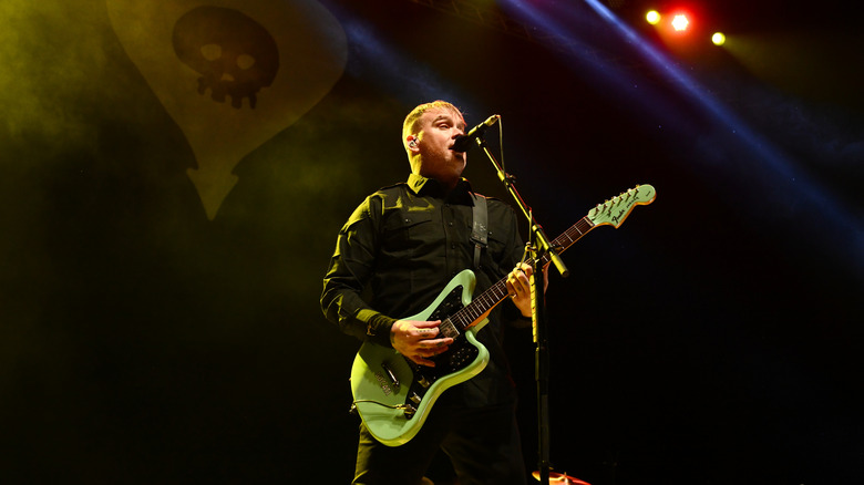 Matt Skiba on stage with guitar