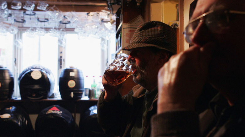 English guy drinking ale in pub