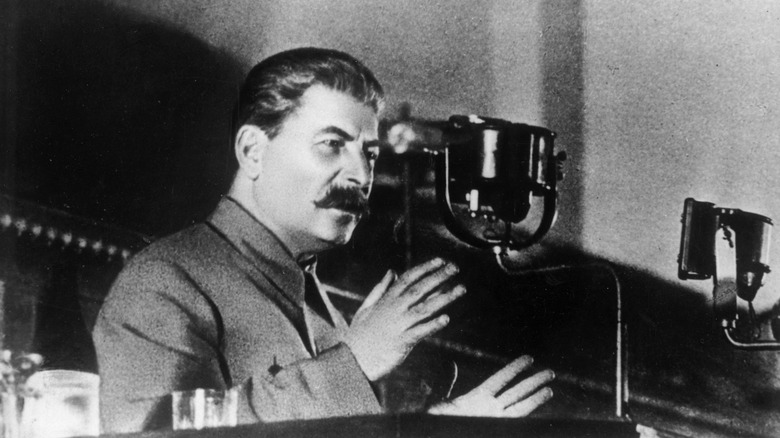 Joseph Stalin at a microphone