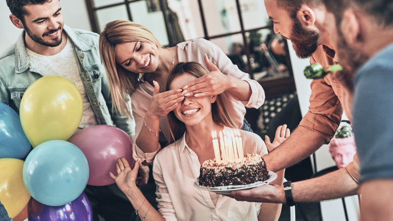 happy people at a birthday party