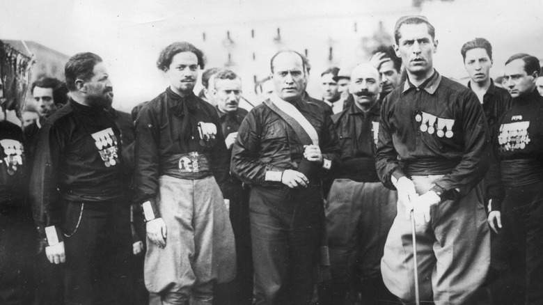 Mussolini and Blackshirts marching