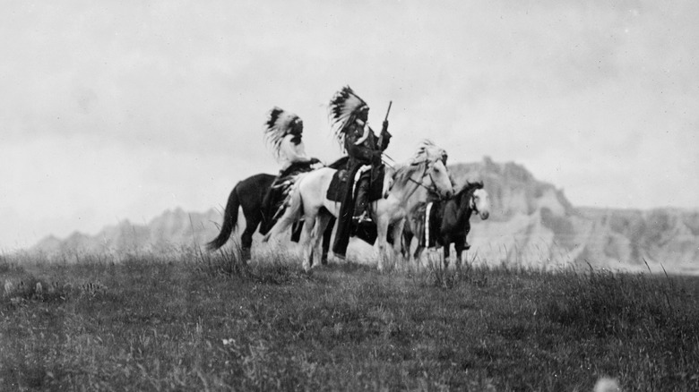 Dakota Sioux warriors on horseback 