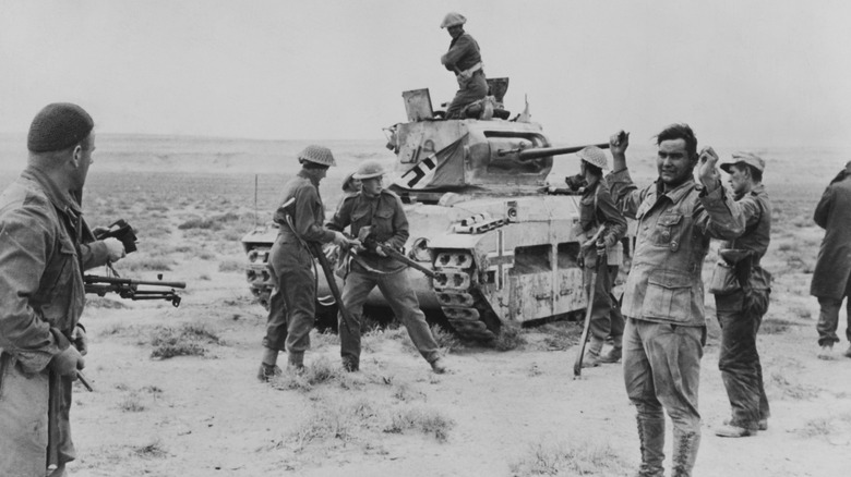 Nazi tank surrendering to American troops 