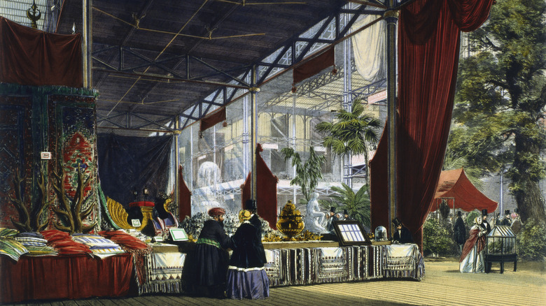 Great Exhibition, Hyde Park, London, 1851. Interior view of the Crystal Palace showing two visitors being shown a stand of oriental products